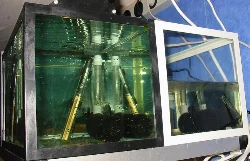 In version IIb there was 3 20 liter tanks and 2 12 liter tanks on the top shelf. Here you see the ends of the 2 12 liter tanks.
